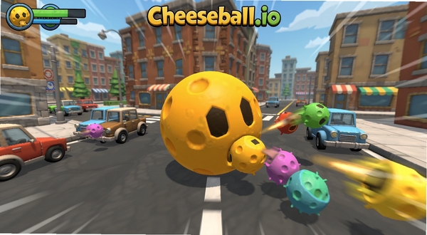 Cheeseball.io游戏对战场面,多个不同颜色的芝士球在城市街道上互相追逐吞噬,画面中央一颗大球正在吞并小球,背景有建筑和车辆,动态感强,3D卡通风格,色彩鲜明