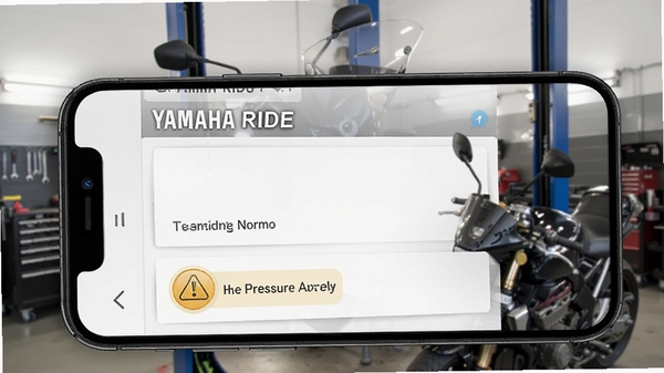 YAMAHA RIDE 车辆诊断报告页面,绿色勾选图标表示各项系统正常,一个黄色警告图标提示胎压异常,手机界面风格专业,背景是摩托车修理车间
