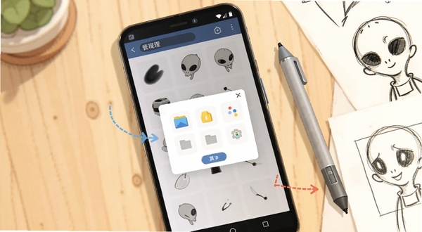 画星人插画笔刷导入操作示意图,画面主体为一部竖屏安卓手机,屏幕显示笔刷管理界面与文件选择弹窗,背景区域为浅木色桌面,旁边放置一支触控笔与几张手绘草图,整体氛围温馨,突出操作引导